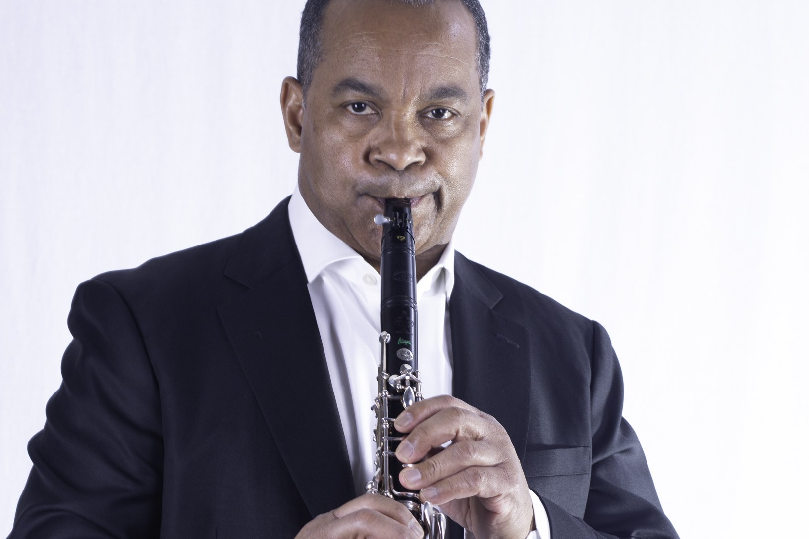 Victor Goines with clarinet, studio portrait